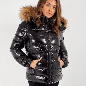 Small jacket never been used, but it is the Mayte type not the shiny one.